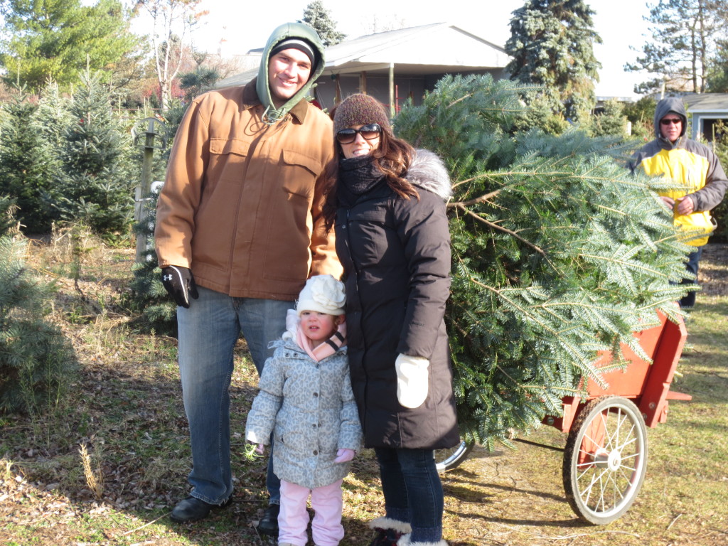 tree picking - ade and scott with b and tree